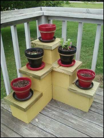 I came up with this idea for a low cost plant stand... 3 8x16 ...