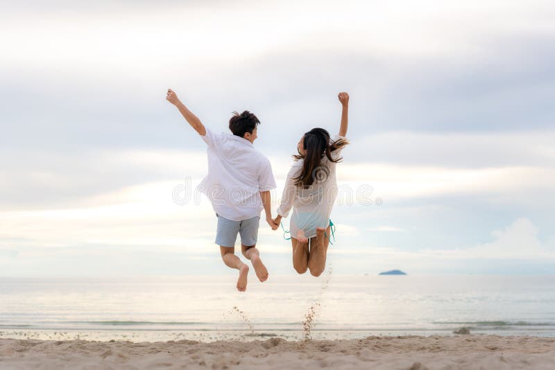 1,478 Happy Couple Jumping Beach Stock Photos - Free & Royalty ...